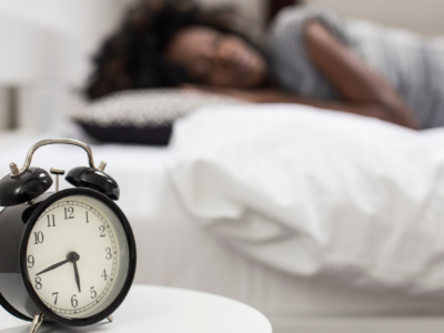 woman adjusting sleep routine after daylight saving time change in spring